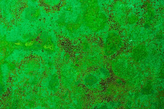 Stone textured background. Abstract texture from an old worn green wall.