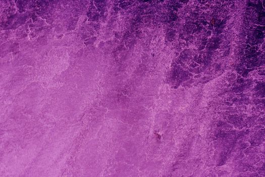 Abstract texture of an old purple worn wall. Abstract marble surface.