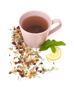 Cup of hot herbal tea isolated on white background