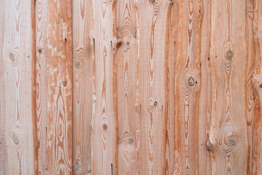 Wooden barn wall made of boards in russian village