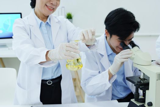 medical research laboratories, scientists analyze chemical samples Discuss technological innovations. Advanced scientific laboratories for medicine, biotechnology