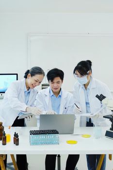 medical research laboratories, scientists analyze chemical samples Discuss technological innovations. Advanced scientific laboratories for medicine, biotechnology