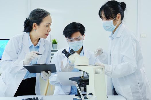 medical research laboratories, scientists analyze chemical samples Discuss technological innovations. Advanced scientific laboratories for medicine, biotechnology