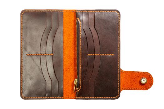 Female brown leather open wallet isolated on a white background.