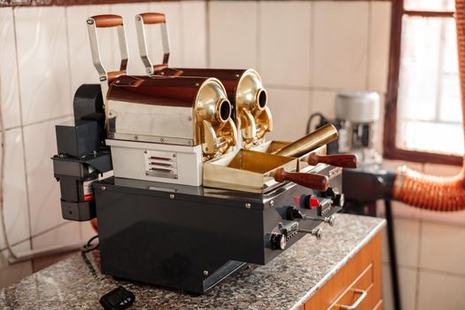 Coffee machine standing at the factory for grinding beans, timer on the table