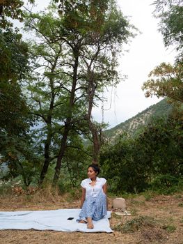 asian hindi woman enjoying relax cloudy day