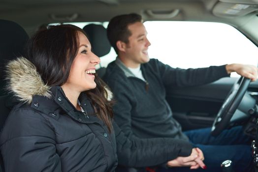 We enjoy our Sunday road trips. a happy young couple out on a road trip