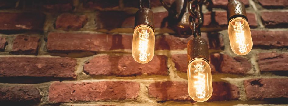Grunge lamp on the wall. Steampunk background Lighting decor