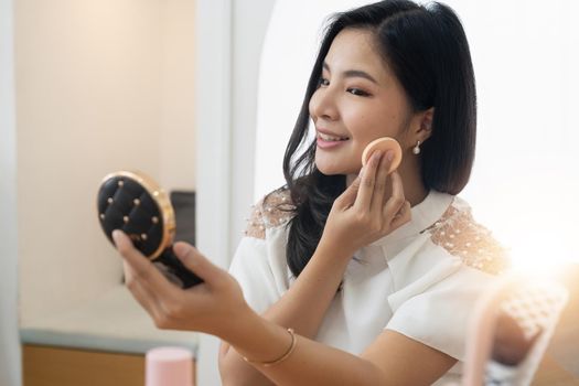 Beauty blogger concept, beautiful and cute asian young woman, girl makeup her face Female look with natural fashion style