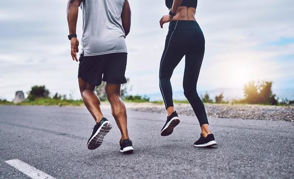 Run towards the healthy lifestyle you want to lead. Closeup shot of a sporty couple exercising together outdoors