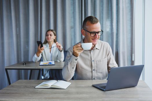 Professional expert working with information for business, corporate money investment report, coffee at work, time on laptop computers, presence of marketing