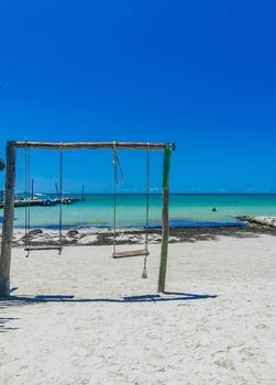 Panorama landscape view on beautiful Holbox island sandbank and beach with waves turquoise water and blue sky in Quintana Roo Mexico.