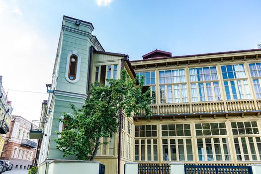 Traditional inner yard with carving wooden baclonies in Kala area in Tbilisi, capital city of Georgia