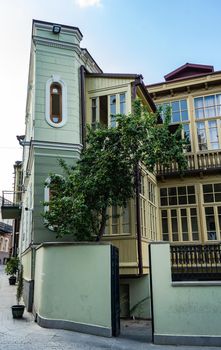 Traditional inner yard with carving wooden baclonies in Kala area in Tbilisi, capital city of Georgia