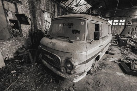 Urbex, abandoned old garage with a old car