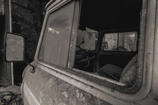Urbex, abandoned old garage with a old car