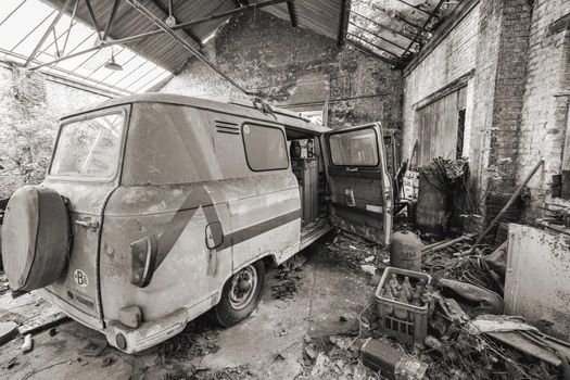 Urbex, abandoned old garage with a old car