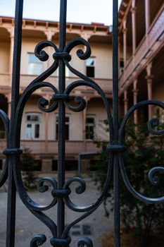 Traditional inner yard with carving wooden baclonies in Kala area in Tbilisi, capital city of Georgia