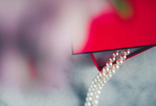 wonderful pearls in a red gift box, luxe present - jewellery and luxury gift for her styled concept