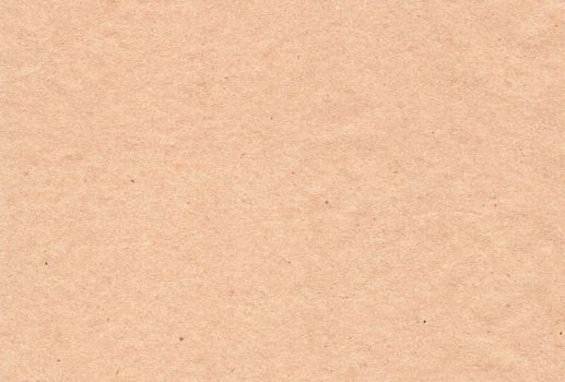 Craft paper texture background. Aged paper sheet. Vintage brown old backdrop.