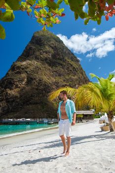 young caucasian white men on vacation in Saint Lucia, luxury holiday Saint Lucia Caribbean, men on vacation at the tropical Island of Saint Lucia Caribbean. sugar beach St Lucia Caribbean