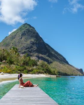 young Asian women on vacation in Saint Lucia, luxury holiday Saint Lucia Caribbean, women on vacation at the tropical Island of Saint Lucia Caribbean. Sugar beach St Lucia Caribbean