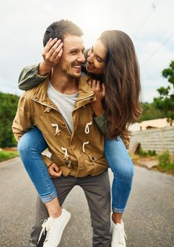 She my lover and my best friend. a playful couple spending the day outdoors