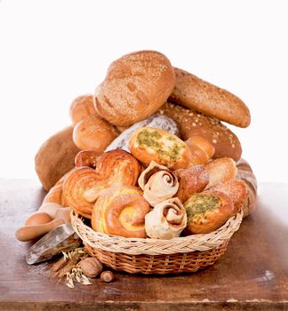 fresh bread and wheat on the wooden