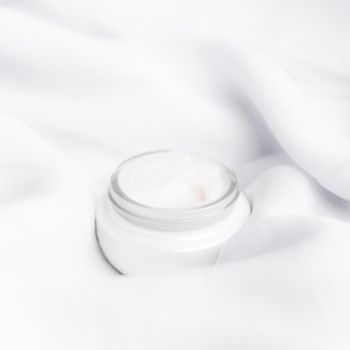 luxury face cream on soft silk - anti-aging, cosmetic and beauty styled concept, elegant visuals