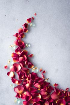 rose petals on marble flatlay - wedding, holiday and floral background styled concept, elegant visuals