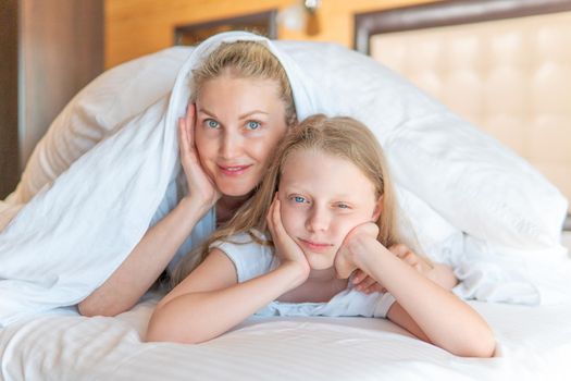 Blanket glad woman daughter family over bed head young eyes, concept lying morning from female from people home, nap bedtime. Beauty face one, day