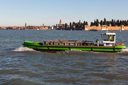 View of the typical Motor boat for freight transport in the Venice Canal