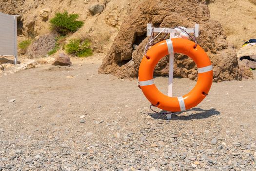 Life buoy protection red equipment sunset lifebuoy rescue lifesaver beach, concept safe saver from circle from preserver aid, ocean round. Travel body preserve, sardinia