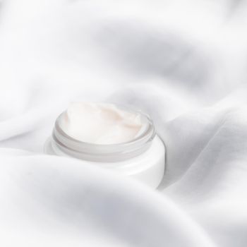 luxury face cream on soft silk - anti-aging, cosmetic and beauty styled concept, elegant visuals