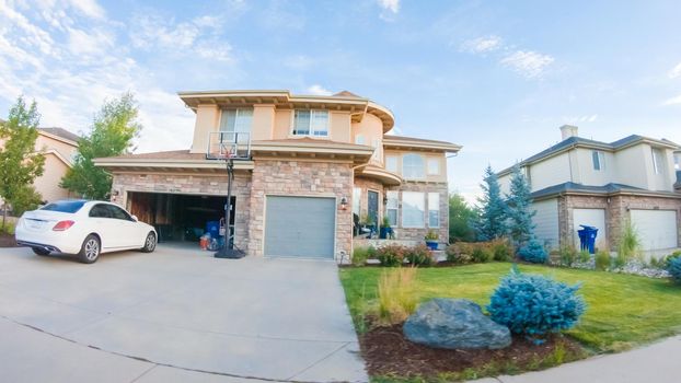 Denver, Colorado, USA-July 19, 2020 - View of the typical suburban neighborhood on a summer morning.