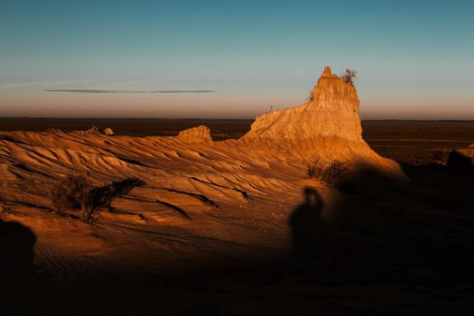 Beautful light and shadow falls across the desert landforms in outback Australia