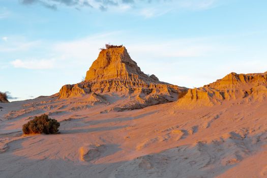 Sandy monuments rise up in the Australian desert