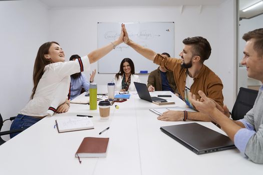 Corporate business team and manager in a meeting at IT company office