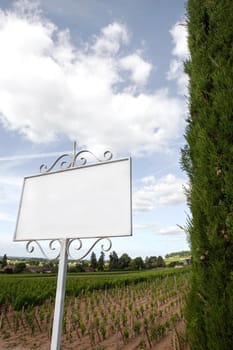 Wrought iron sign in the vineyards of a French winery