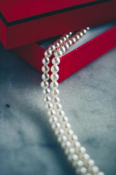 wonderful pearls in a red gift box, luxe present - jewellery and luxury gift for her styled concept, elegant visuals