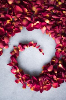 rose petals on marble flatlay - wedding, holiday and floral background styled concept, elegant visuals