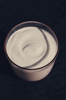 dairy and rustic farm food styled concept - fresh creamy white yogurt, elegant visuals