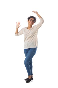 Happy smiling woman wearing casual clothes standing with arms raised full length portrait isolated over a white background