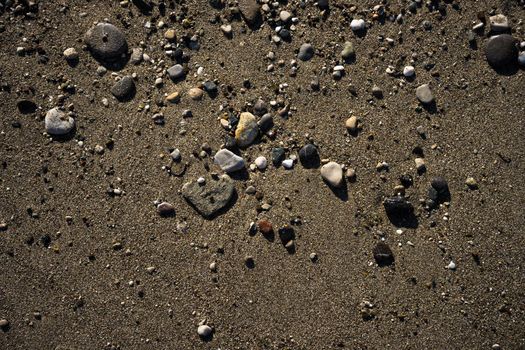 Summertime relax on the sand beach with sea waves