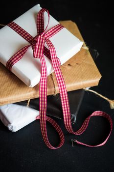 Christmas gift boxes on rustic background as a holiday concept with copyspace