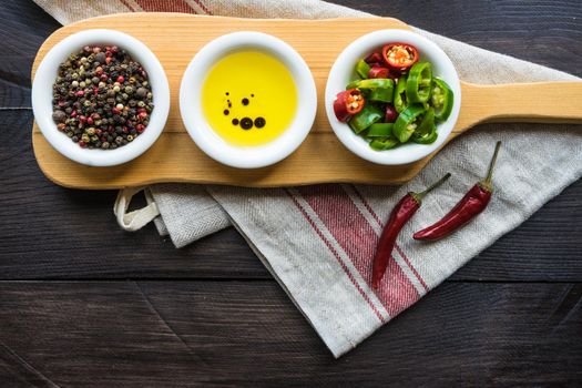 organic spices for salads - pepper corn, pepper, and oil with soy