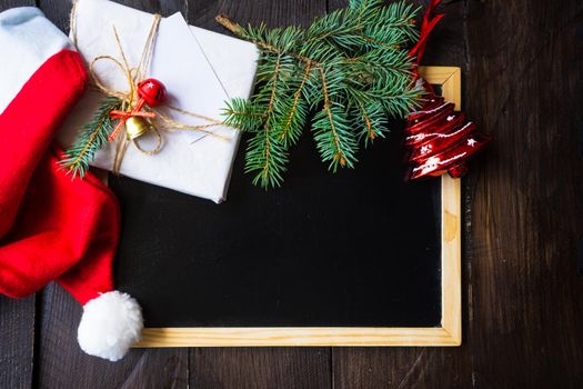 Festive Christmas themed frame with gift box and chalk board