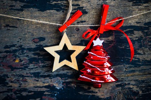 Christmas frame with wooden rustic toys on dark wooden background