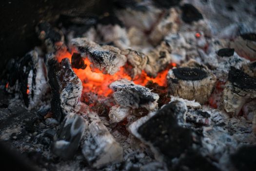 Burning charcoal with fire in a grill place