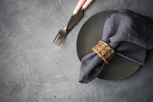 Rustic table setting for  dinner with vintage flatware and decoration